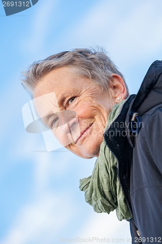 Image of happy grey-haired elderly woman senior outdoor