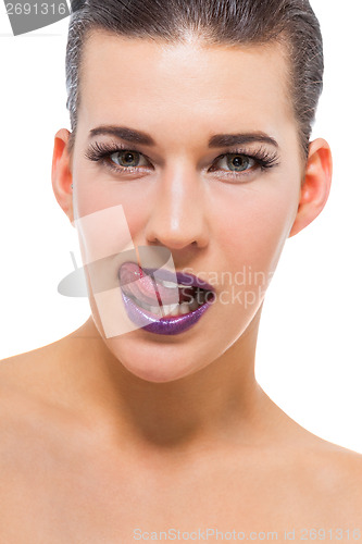 Image of Graceful attractive woman with purple lips and nails