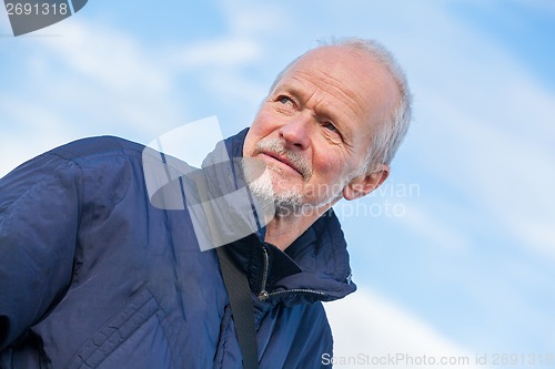 Image of Senior man with a thoughtful expression
