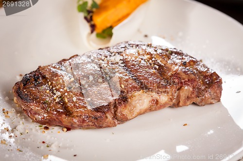 Image of Grilled beef steak with seasoning