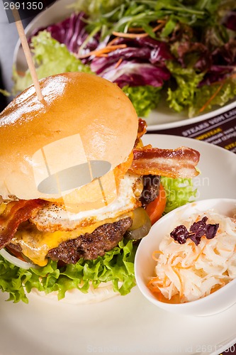 Image of Delicious egg and bacon cheeseburger