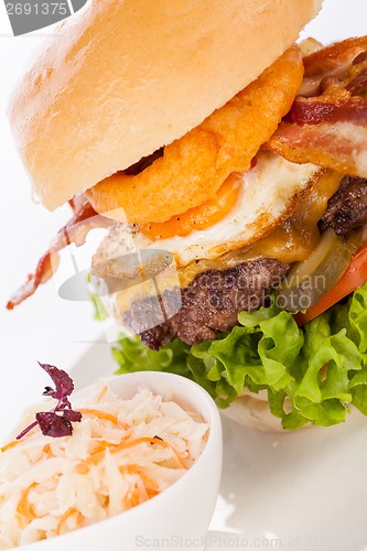 Image of Delicious egg and bacon cheeseburger