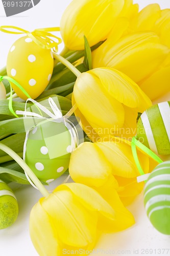 Image of Colourful yellow and green spring Easter Eggs