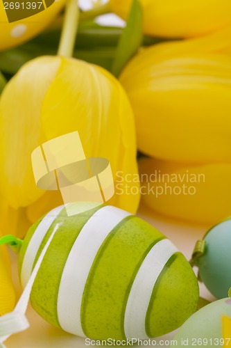 Image of Colourful yellow and green spring Easter Eggs