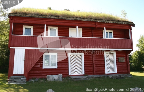 Image of Red timber house