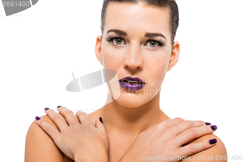 Image of Graceful attractive woman with purple lips and nails