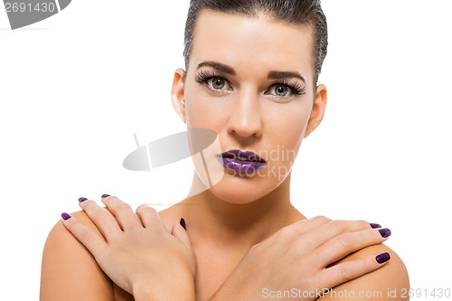 Image of Graceful attractive woman with purple lips and nails