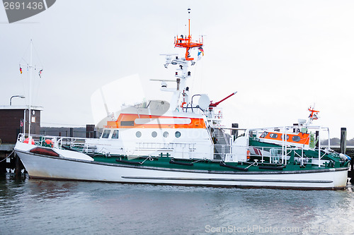 Image of Cabin cruiser moored in the harbour