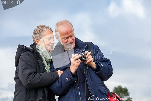 Image of Elderly couple taking a self portrait