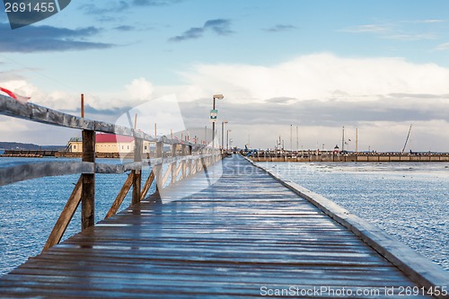 Image of Bridge or pier across an expanse of sea