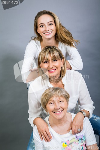 Image of Three generations with a striking resemblance