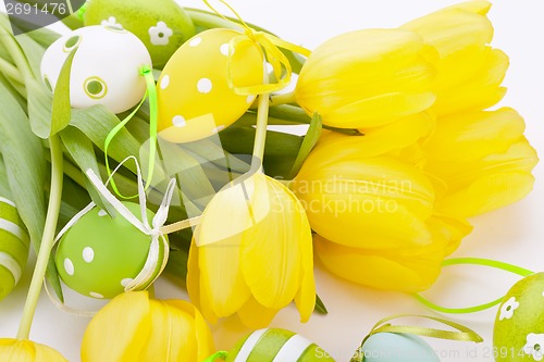 Image of Colourful yellow and green spring Easter Eggs