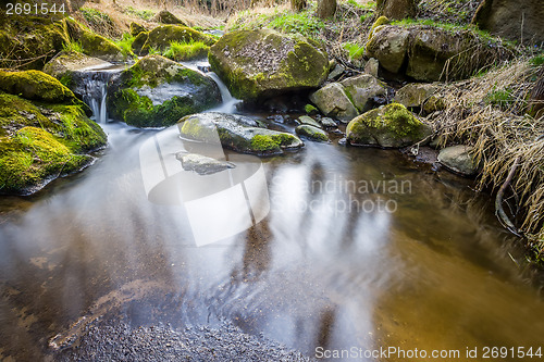 Image of Falls on the small mountain river in a wood