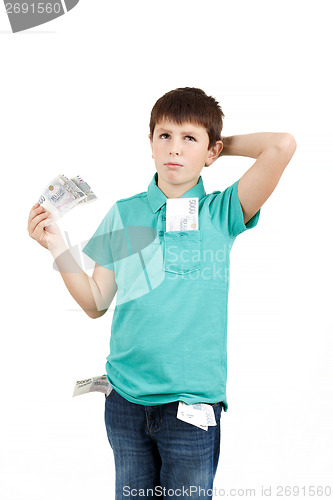 Image of boy holding czech crown banknotes