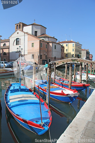 Image of three blue boats