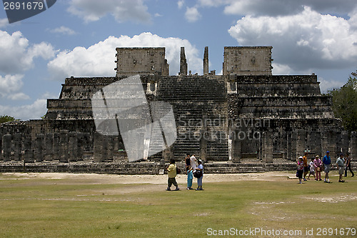 Image of people a wild angle of the chichen itza temple tulum 