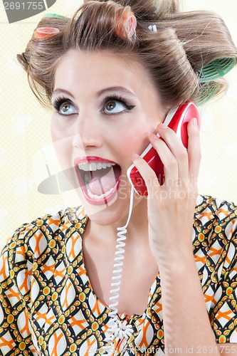 Image of Surprised Woman Using Telephone