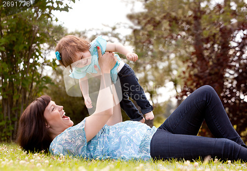 Image of Mother and Daughter Playing in Park