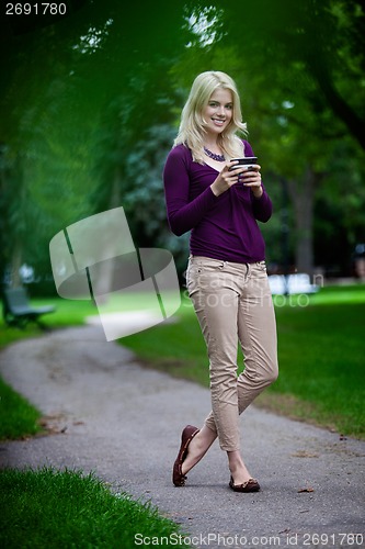 Image of Woman Using Cell Phone