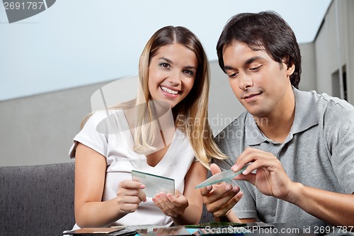 Image of Couple Holding Glass Tile Swatch