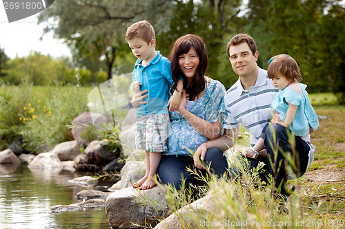 Image of Family Near Lake in Park