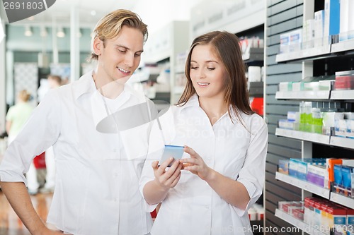 Image of Young Couple Shopping At Supermarket