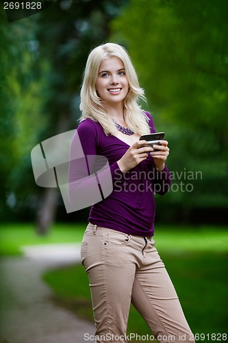 Image of Woman Using Cell Phone