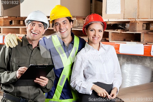 Image of Portrait of Happy Foreman With Supervisors