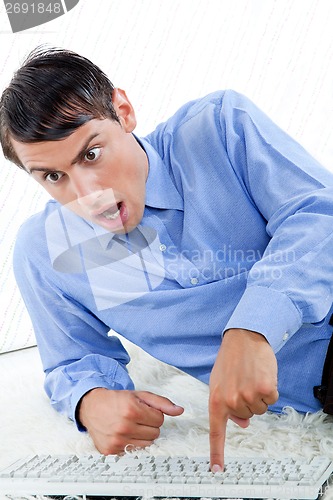 Image of Surprised Man with Keyboard