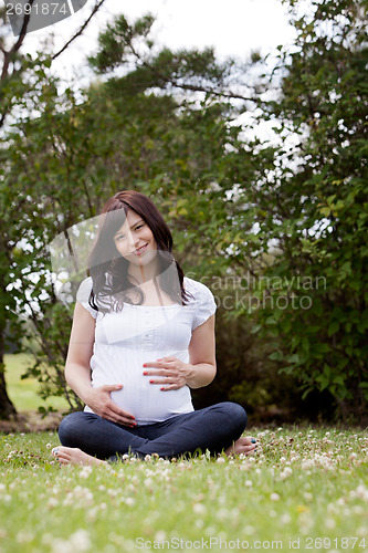Image of Attractive Pregnant Woman Outdoors