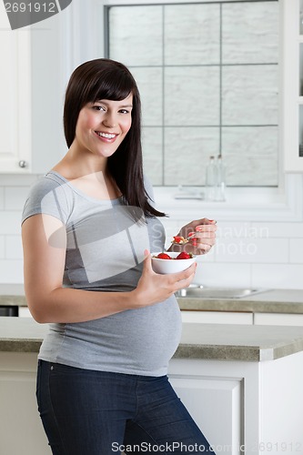 Image of Woman Eating Healthy Fruit