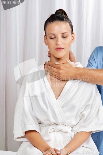 Image of Woman Receiving Neck Massage