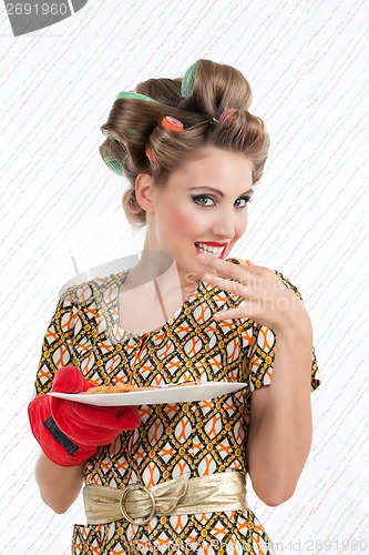 Image of Woman Eating Cookies