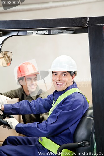 Image of Casual portrait of two men in Warehouse