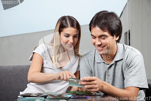 Image of Couple Choosing Glass Tile Swatches