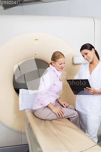 Image of Female Technician With Mature Patient