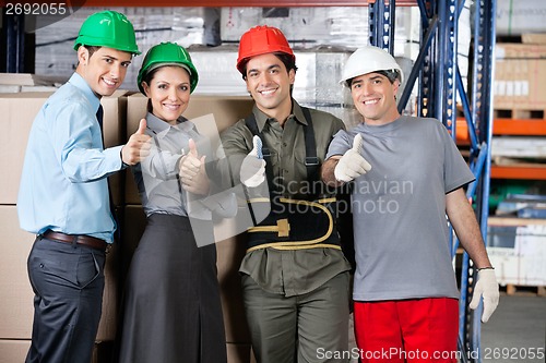 Image of Happy Foremen And Supervisors Gesturing Thumbs Up