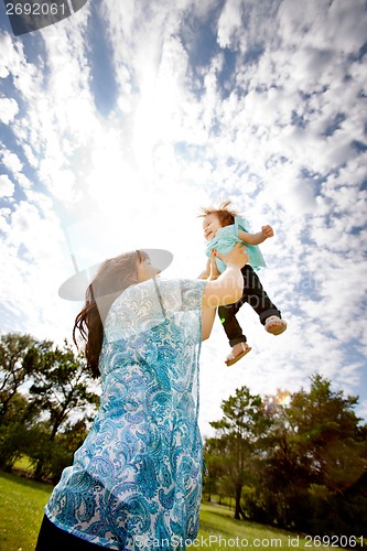 Image of Playful Mother with Daughter