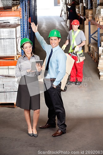 Image of Supervisors And Foreman Working At Warehouse