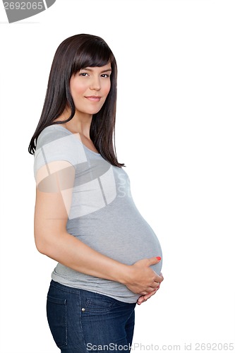 Image of Pregnant Woman With Hands On Stomach