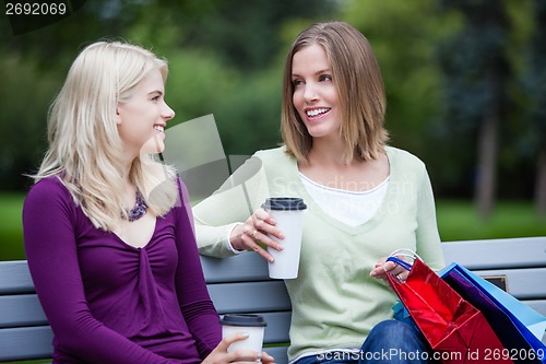 Image of Shopping Women with Takeaway Coffee