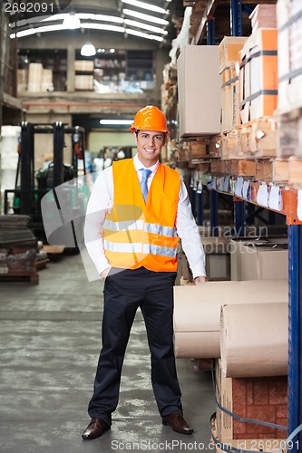 Image of Confident Supervisor Standing At Warehouse