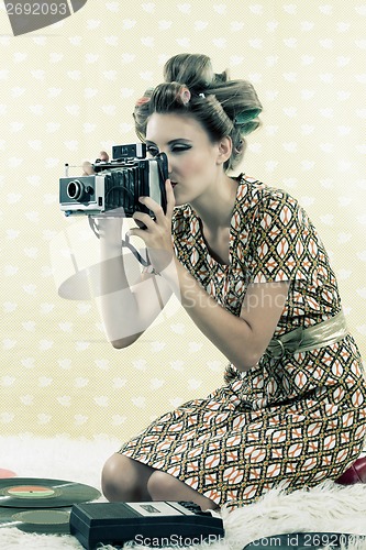 Image of Woman taking Photograph