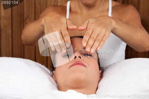 Image of Woman Receiving a Face Massage