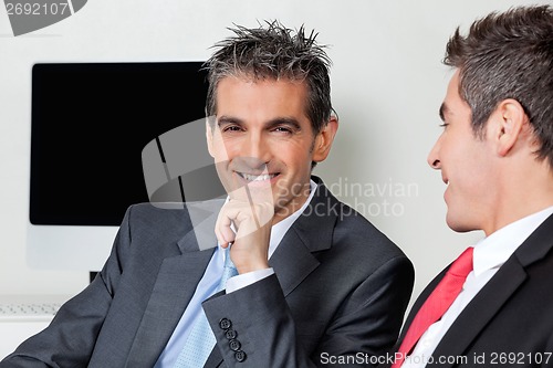 Image of Happy Businessman With Colleague