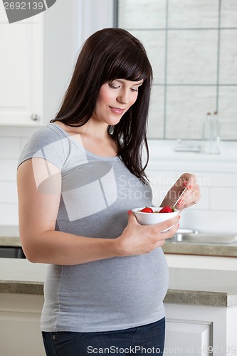 Image of Woman Eating Healthy Fruit