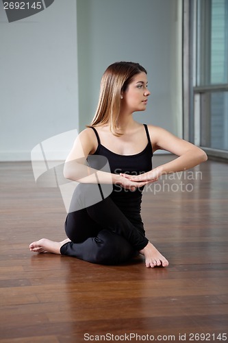 Image of Woman Practicing Yoga Exercise