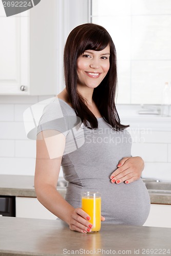 Image of Pregnant Woman with Orange Juice