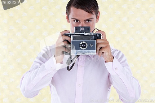 Image of Retro man with Medium Format Camera