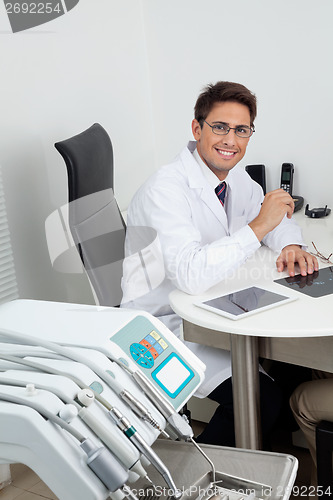 Image of Happy Dentist In Dental Clinic